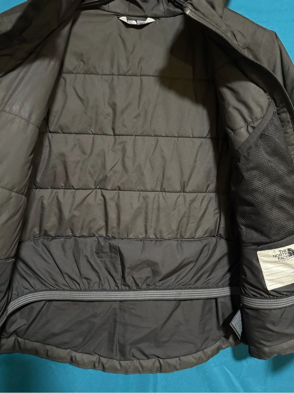 The North Face Kids Black Hooded Shell Jacket with White Logo